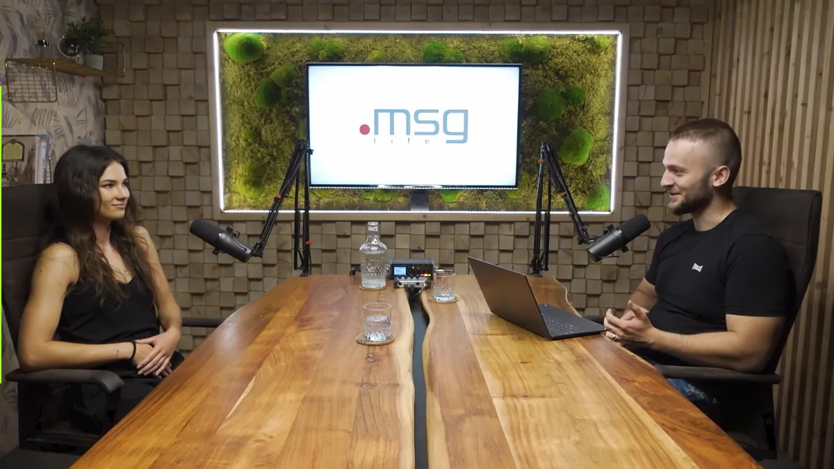 IT tester Xenia and Michal Hucko talking in the studio while recording a podcast